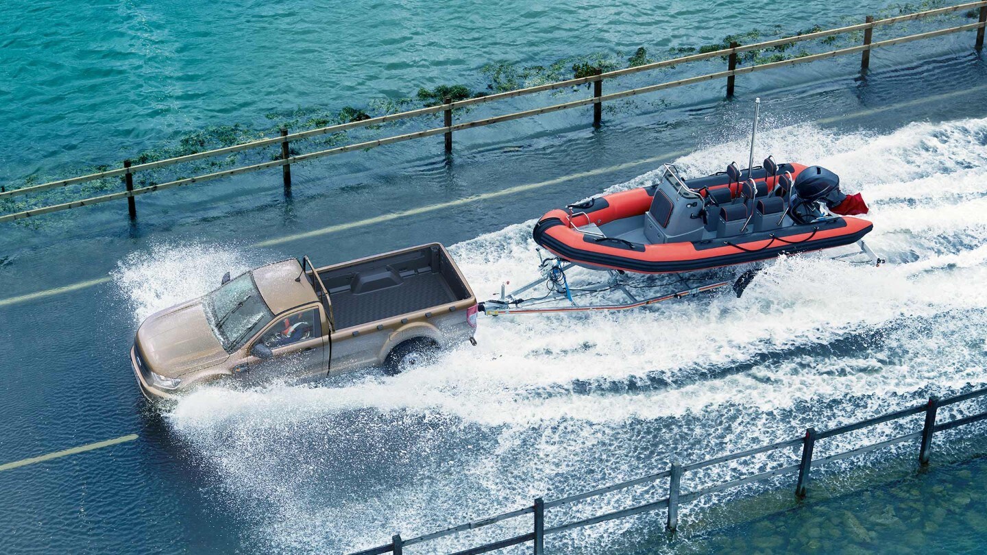 Ford Ranger in water towing boat