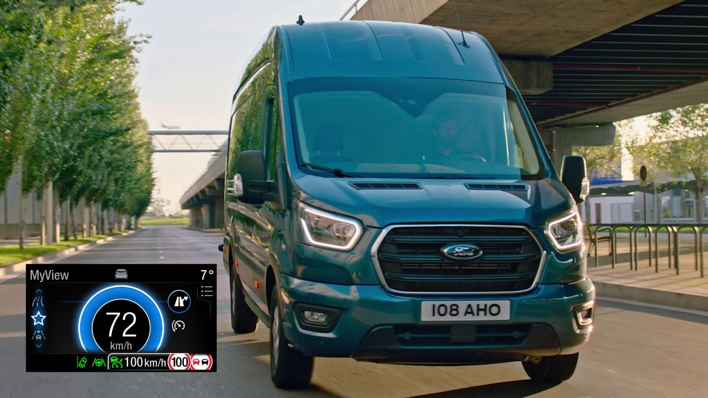 Ford Transit Van driving on motorway front view with Eco Mode dial in detail